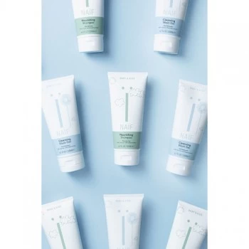 NAIF MINI SET - ŠAMPON, GEL ZA KUPANJE, NEGUJUĆA KREMA, LOSION ZA TELO 4 x 15 ML